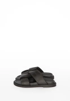 Black leather padded cross mules